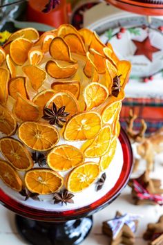 there is a cake with orange slices on it