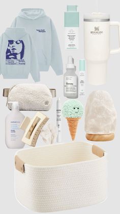 the contents of a baby's diaper bag including an ice cream cone, bottle and other items