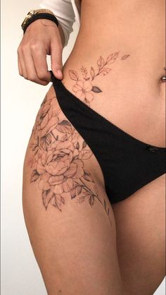 a woman's stomach with flowers on it