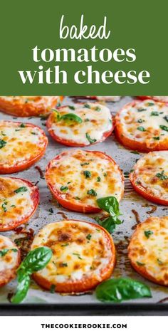 baked tomatoes with cheese and basil on a baking sheet in the oven, text overlay reads baked tomatoes with cheese