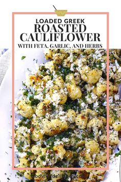 loaded greek roasted cauliflower with feta, garlic and herbs on a white plate