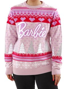 a woman wearing a sweater with the word barbie on it