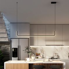 a kitchen with marble counter tops and wooden stools next to a stair case that leads up to the second floor