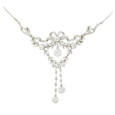 An important Edwardian diamond garland necklace, the necklace in the 'style garland', designed at the front as an articulated openwork frame embellished with tied ribbon bows and foliate motifs, set with single- and rose-cut diamonds, highlighted by seven principal circular-cut diamonds, estimated to weigh a total of 11.5 carats, all set in platinum to knife-edge settings and a fine chain, gross weight 25.6 grams, circa 1900 Edwardian Necklace, Edwardian Jewelry, Antique Diamond, Victorian Jewelry, Vintage Jewels, Fantasy Jewelry, Art Deco Jewelry, The Library, Dream Jewelry