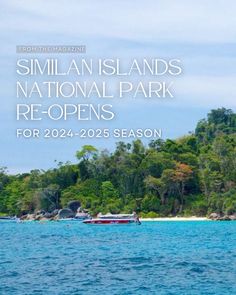 an island with trees and boats in the water