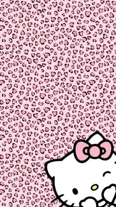 a hello kitty wallpaper with pink and black leopard spots on it's surface