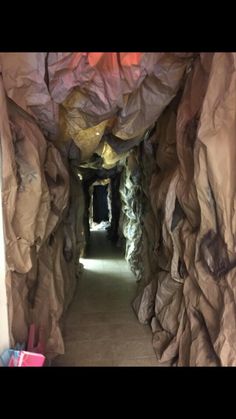 the tunnel is covered in paper and plastic bags