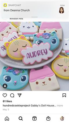 some cookies that are on a plate with the words happy written in it and other decorations