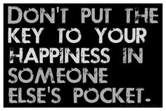 a sign that says don't put the key to your happiness in someone else's pocket