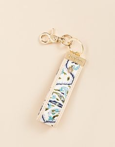 a keychain with an animal print on it