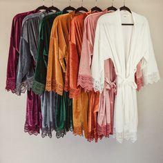 Each robe is made with fine velvet fabric and features a detailed crochet trim around the sleeves & bottom that give it a touch of extra elegance. The robes have an inside tie and a sash to tie around your waist, and are one size fits all for your convenience. Give yourself or your valentine the gift of luxury on Valentine's Day! Our robes are in stock and ready to go. We ship quickly from Colorado, USA. SIZING - Our robes are made from soft, stretchy material with lace detailing on the sleeves Bridal Shower Presents, Wedding Gift For Bride, Robe Wedding, Bridal Party Robes, Gift For Bride, Wedding Gifts For Bride, Bridesmaid Proposal Gifts, Bridesmaid Robes, White Bridal