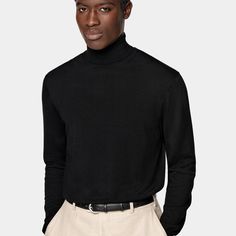 An era-transcending style icon of creatives and creators, the black turtleneck is a true wardrobe essential that's never out of style. This classic layering piece features a ribbed hem and tapered cuffs. Black Turtleneck For Workwear In Fall, Black Turtleneck For Fall Workwear, Black Turtleneck For Fall Layering, Black Turtleneck For Winter Layering, Black Business Sweater For Fall, Ribbed Collar Turtleneck For Fall Workwear, Fall Workwear Turtleneck With Ribbed Collar, Fall Turtleneck With Ribbed Collar For Work, Fall Ribbed Collar Turtleneck For Work