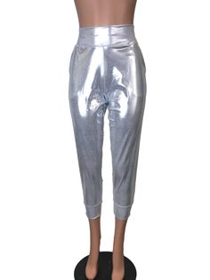 "**Due to SO MANY issues with USPS - we STRONGLY ENCOURAGE you to purchase the UPS Upgrade with your order located here: https://www.etsy.com/listing/926751536/ups-upgrade New style! These joggers with pockets are made of high-quality mystique metallic spandex in a gorgeous silver color. These jogger pants are fitted high on the natural waist and slightly flared out to be loose around the hips and thighs, then tapered to the ankles. You can pull up the pant legs for a \"scrunched\" capri look or Rave Festival, Womens Capris, Rave Wear, Pull Up, Jogger Pants, Fashion Pants, Silver Color, Metallic Silver, Capri