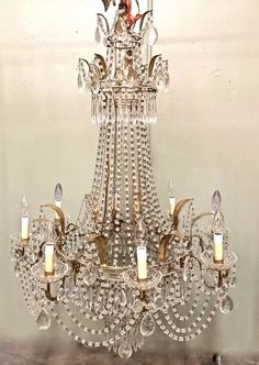 a crystal chandelier hanging from the ceiling