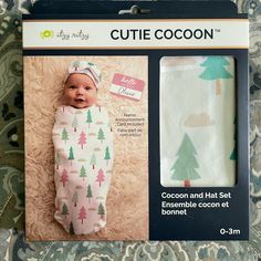 the packaging for a baby's cocoon and hat set