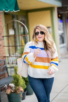 Striped Sweater featured by top US fashion blog Coffee Beans and Bobby Pins; Image of a woman wearing Express striped sweater, J.Crew jeans, DSW mules, Amazon sunglasses, Sugarfix earrings and Louis Vuitton bag. Sugarfix Earrings, Amazon Sunglasses, Petite Curvy, Spring Coffee, Curvy Fashionista, Buy Sweaters