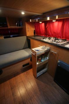 a kitchen with a stove top oven sitting inside of it