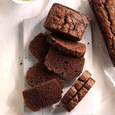 some brownies are sitting on a white plate