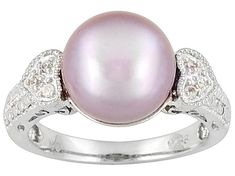 11-12mm pink cultured freshwater grande pearl, round, with .05ctw white topaz accent, round, sterling silver heart design ring. Measures approximately 7/16"L x 1/16"W. Not sizeable. Color varies. Winter Whites, Jtv Jewelry, Pearl Types, Silver Band Ring, Pink Ring, Pink Pearl, Topaz Gemstone, Sterling Silver Heart, Topaz Ring