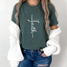 This trendy faith t-shirt with Bible verse is a fashion-forward way to wear your faith in style.  It's versatile to go with many fashion outfits for any season!  Pair it with jeans and your favorite fall shacket for a classy fall fashion or keep it casual with leggings and a cozy flannel or denim button-up shirt.   Christian t-shirts are a great way to express your faith with confidence, comfort, and style! This faith t-shirt is a unique faith design in the shape of a cross with Ephesians 2:8 Bi Non-stretch Cotton Casual T-shirt, Trendy Comfortable Fit T-shirt For Fall, Trendy Comfort Fit T-shirt For Fall, Non-stretch Tops For Everyday Fall Wear, Inspirational Cotton T-shirt For Fall, Comfortable Fit T-shirt For Fall, Classy Fall Fashion, Ephesians 2 8, Faith Design