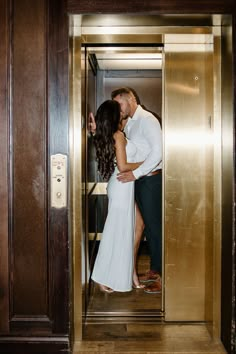 An Engagement Photoshoot at the Oxford Exchange in Tampa, Florida. Bride wearing a long white dress in the elevator. Editorial Engagement Photos, Indoor Engagement Photos, Classy Vibes, Tampa Wedding Venue, Oxford Exchange, Courthouse Wedding Photos, City Engagement Photos