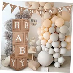 a baby shower party with balloons and decorations