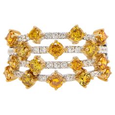 It comes with the appraisal by GIA GG/AJP 16 Fancy Yellow Diamonds = 1.25 Carats 38 White Diamonds = 0.30 Carats Origin: Natural, Cut: Round Metal: 18K White and Yellow Gold Ring Size: 7* US *It can be resized complimentary Multi Band Ring, Yellow Diamonds, Fancy Yellow Diamond, Gold For Sale, White Diamond Ring, Diamond Cocktail Rings, Modern Ring, Rough Diamond, Yellow Diamond