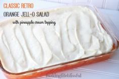 an orange jell - o - salad in a glass dish