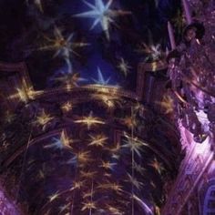 the ceiling is decorated with stars and lights