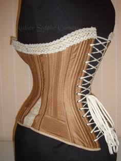 "Pattern ref : \"V\" Digital download includes a pattern and several pictures of the antique corset that the pattern has been drafted from. Both worn and displayed on a mannequin. Ordering this pattern includes an instant download of the following four PDFS: -Instructions on printing your pattern -Printer test page to ensure pattern prints at the correct scale -Documents -a full size 1:1 scale pattern You will also be sent the following documents in a direct message: -Online file showing photos Victorian Underbust Bodice With Corset Back, Victorian Corset With Historical Design, Victorian Corset With Boning, Victorian Corset Dress With Boned Bodice, Victorian Style Corset With Fitted Bodice, Historical Underbust Corset With Fitted Bodice, Victorian Underbust Corset Dress With Boned Bodice, Vintage Wedding Corset Belt With Boned Bodice, Victorian Fitted Corset For Costume