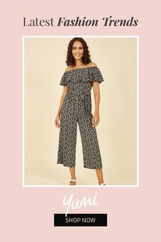 Feminine frills to show off in for the summer! This Mela Black Daisy Print Bardot Jumpsuit is crafted from a lightweight fabric, for an easy breathable feel. With wide leg fit culotte legs, Bardot neckline with frill detail and self-tie belt, this versatile piece is perfect for a summer day. Pair with sandals or trainers for easy everyday style. Chic Polka Dot Jumpsuits And Rompers For Summer, Casual Polka Dot Jumpsuits And Rompers For Summer, Black Daisy, Bardot Neckline, Jumpsuit Outfit, Daisy Print, Belt Tying, Summer Day, Tie Belt