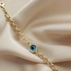 "Ⓜ14 K Gold Rolo Doc Evil Eye Bracelet Charm Chain Hoop Birthdays Gift For Women Luck Blue Gold Jewelry Design Handmade Dainty ⓂEvil Eye Bead Bracelet People have used Evil Eye Bead to avoid bad looks since long time. You can give a gift to the people you cared who dazzle with their beauty and want to be protected from the evil eye. This Evil Eye Bead Bracelet symbolizes grace and elegance. We designed this bracelet for you beautiful women who are always loved and do not compromise on their eleg 14k Gold-tone Charm Bracelet As Gift, 14k Gold Chain Bracelet With Birthstone, Elegant Blue Chain Bracelet As Gift, Elegant Blue Chain Bracelet For Gift, Yellow Gold Birthstone Chain Bracelet, Yellow Gold Charm Bracelet Chain As Gift, Yellow Gold Chain Charm Bracelet As Gift, Gold Charm Bracelet With Birthstone, 14k Gold Chain Charm Bracelet Gift