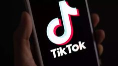 the tiktok logo is displayed on an iphone