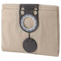 a beige bag with a black and white circle on the front, hanging from it's side