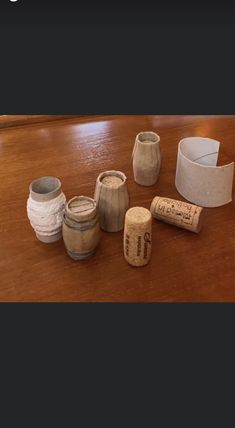 several wine corks are arranged on a table