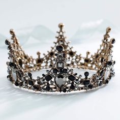 a tiara with black and white stones on it