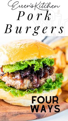 a burger with lettuce and black olives on it next to french fries