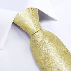 FEATURES Beautiful Eye-Catching Design High-Density Durable Fabric Perfect for Daily Dress, Business, Office, Meeting, Birthday, Wedding, Engagement, Ball Party and More Occasion. Comes in protective and simple packing, easy to wrap and ready to gift WHAT YOU GET Matching Necktie Matching Cufflinks Matching Pocket Square SPECIFICATIONS Material: 100% Jacquard Woven Silk Density of 1200 stitches Designer: Italian Necktie Size: 59.06''(150cm) in length and 3.35''(8.5cm) in width Handkerchief Size: Gold Tie For Father's Day Gift, Gold Tie Gift For Father's Day, Gold Suit And Tie Accessories For Father's Day, Classic Gold Ties For Father's Day, Classic Gold Tie For Father's Day, Elegant Gold Suit And Tie Accessories For Father's Day, Gold Tie For Father's Day, Classic Yellow Wedding Tie, Elegant Adjustable Gold Tie