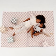 Elevate your nursery and playtime with the Toki Mats x Project Nursery Checker Padded Play Mat! This brand new collaboration brings together Toki Mats' luxurious comfort and Project Nursery's trendsetting style to create the perfect spot for your baby's tummy time or your toddler's playtime adventures. Shop the full Toki Mats x Project Nursery Collection. Details + Dimensions: Choose your size + foam insert option Standard is approximately 40" x 40" x 1" Mega is approximately 55" x 55" x 1" Epic Padded Play Mat, Baby Tummy Time, Bean Bag Couch, Toddler Outdoor, Cozy Seats, Bean Bag Covers, Toddler Play, Project Nursery, Support Pillows