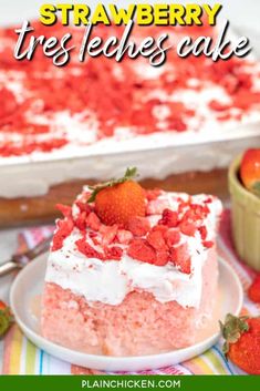 strawberry trese cake on a plate with strawberries around it and the text overlay reads, strawberry treses cake