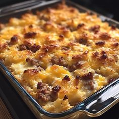 a casserole dish with meat and cheese in it