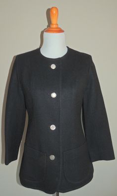 You are bidding on a women's Boston Store made in England size 35 Chest (NO SIZE TAG) black 4 button blazer/jacket made of 100% wool. It is fully lined, has 2 functional pockets and padded shoulders. This blazer/jacket is pre-owned, but has been inspected and is in great condition. All questions are welcome. Happy bidding! Verify your measurements with those of the blazer. BLAZER MEASUREMENTS A. 15" B. 35" C. 33" D. 28" E. 21" Blazer Buttons, Size Tag, Chef's Jackets, Blazer Jacket, Boston, The 100, Long Sleeve Blouse, England, Blazer