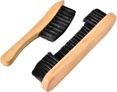 two black brushes sitting next to each other