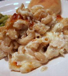 a white plate topped with macaroni and cheese