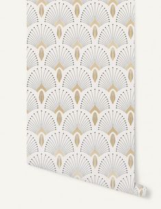 a wallpaper with gold and white fan design on the front, against a white background