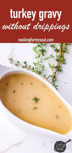 a white bowl filled with soup and garnished with parsley on the side