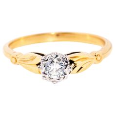 Lovingly crafted in 18 carat gold, The Anita Ring is a vintage enchantment. Her band reaches up on leaf-like shoulders to present a diamond cradled in white gold. A sweet promise. The Anita Ring Gem Details The round brilliant cut diamond is estimated to weigh 0.16 carats with F colour and VS clarity grades. Ring Size M 1/2 (Australia and UK sizing) or 6 1/2 1/4 (US and Canada) The Anita Ring can be resized prior to shipping upon request. Resizing is complimentary up or down three sizes, or plea Diamond Solitaire Ring, Rings Diamond, Diamond Solitaire Rings, Brilliant Diamond, Vintage Jewellery, Round Brilliant Cut Diamond, Diamond Solitaire, Brilliant Cut Diamond, Solitaire Ring