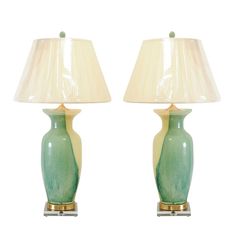 two green lamps sitting next to each other