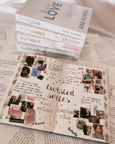 an open book sitting on top of a bed next to two books with pictures in them