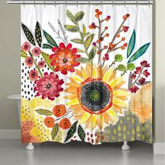 a shower curtain with flowers and leaves on it